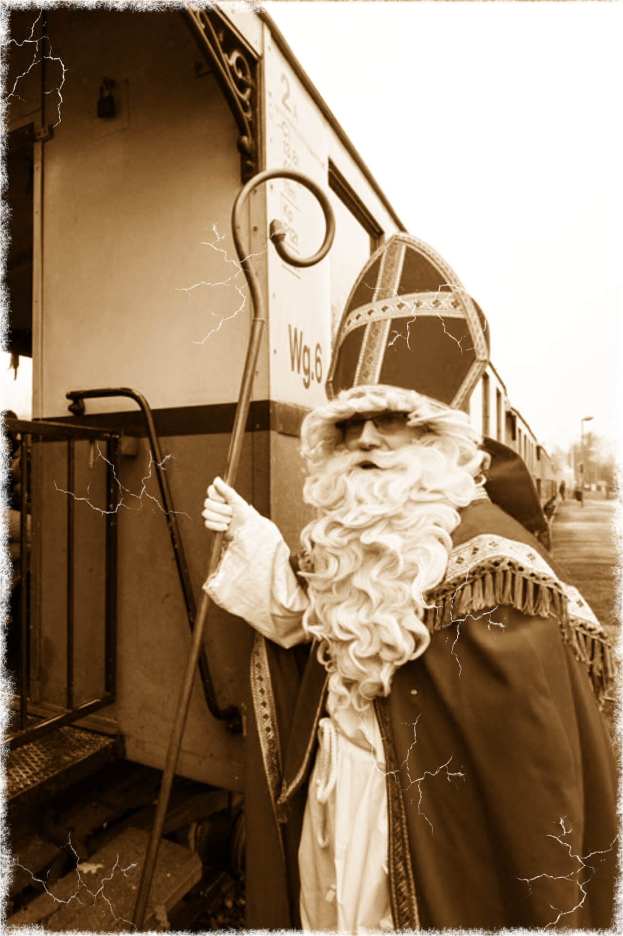 Father Christmas in front of a train carriage
